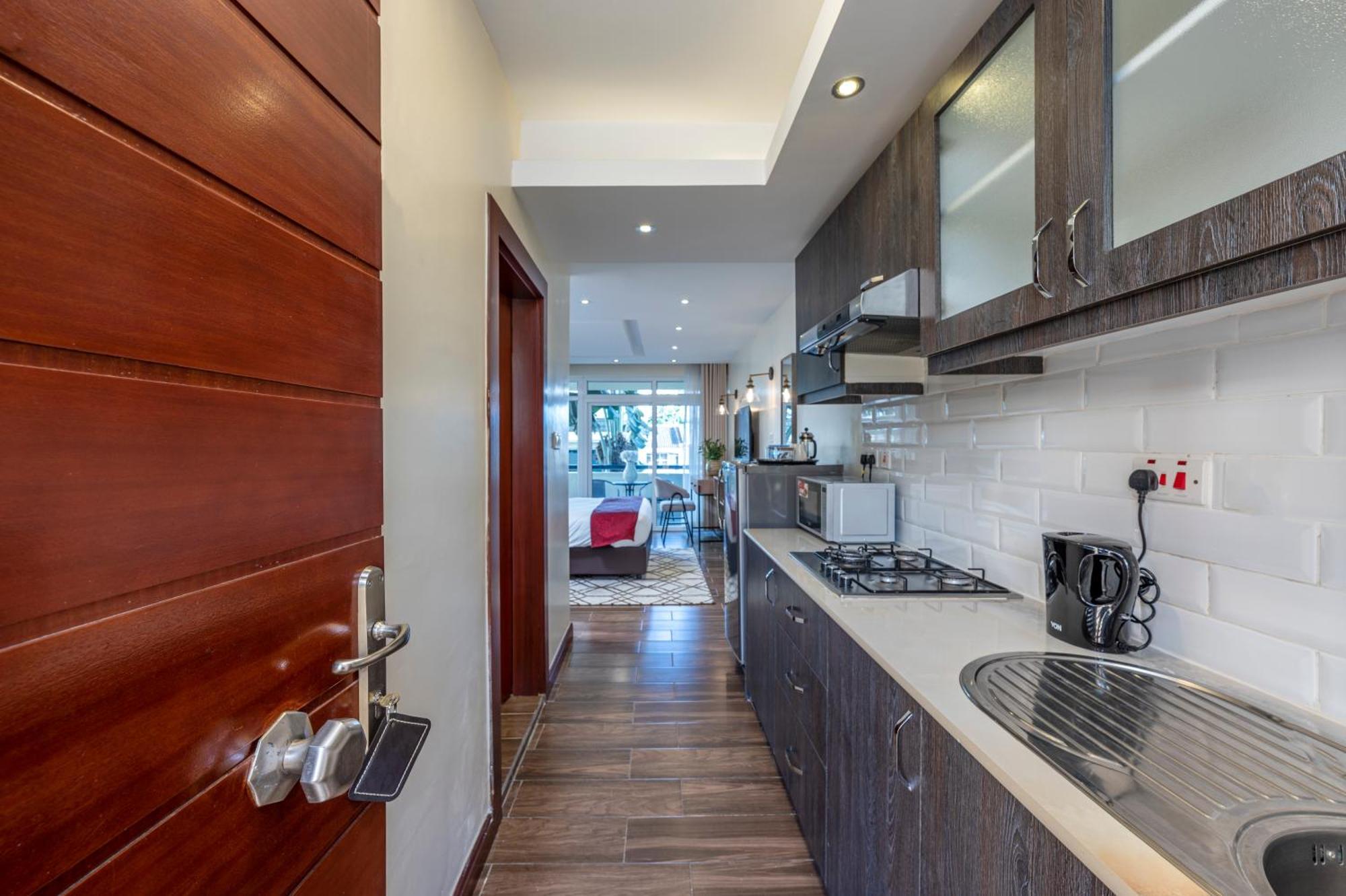 Roma Court Serviced Apartments Найроби Экстерьер фото